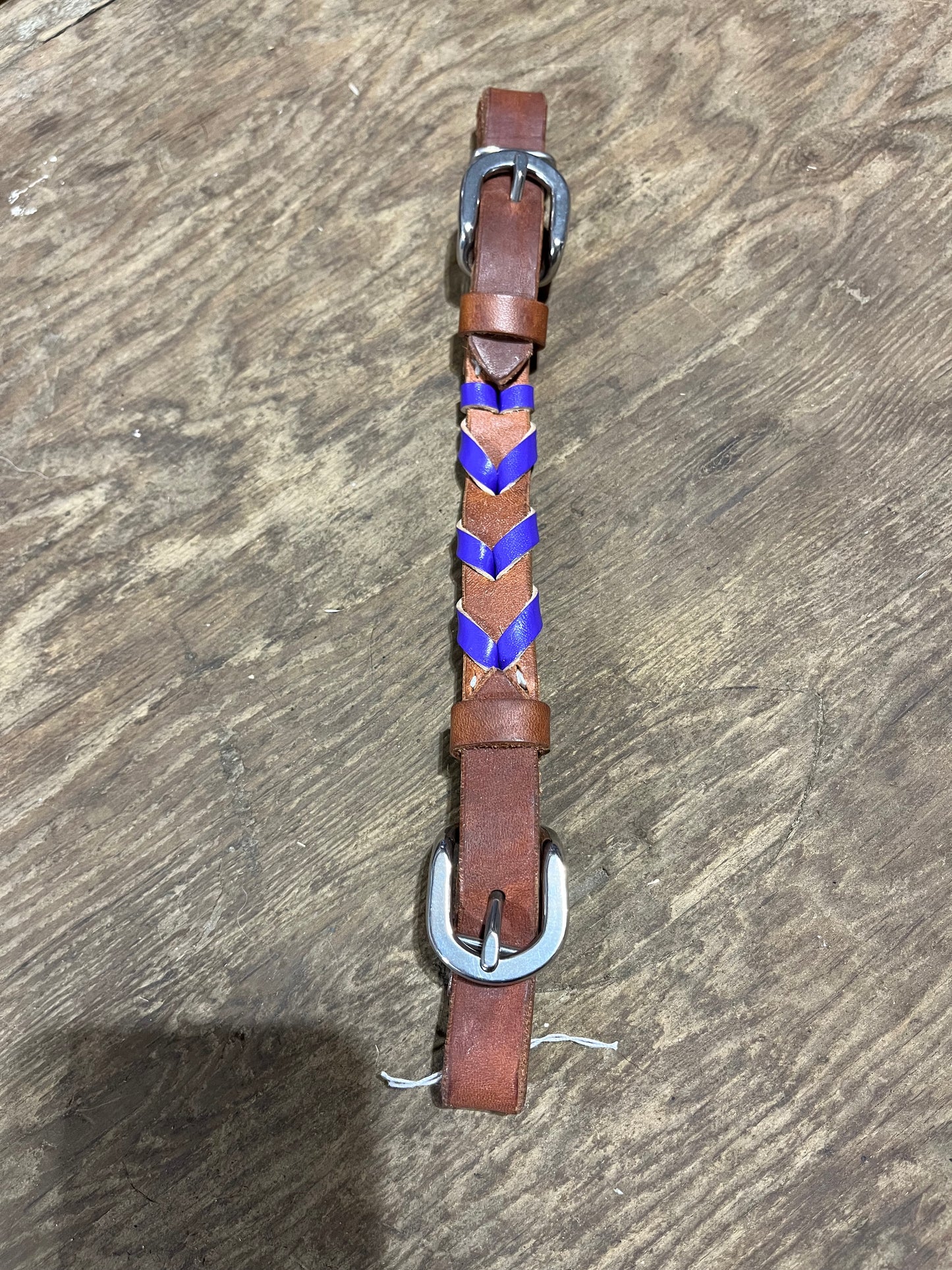 Purple laced curb strap