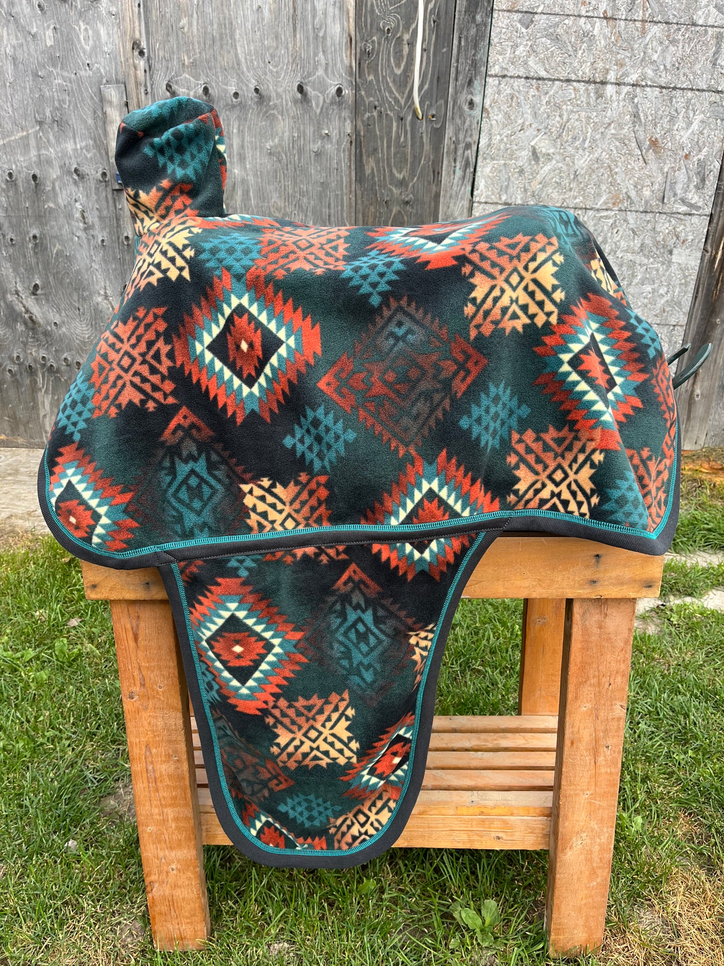 Aztec Western fleece full coverage saddle cover with fenders, horn, & stirrup pockets