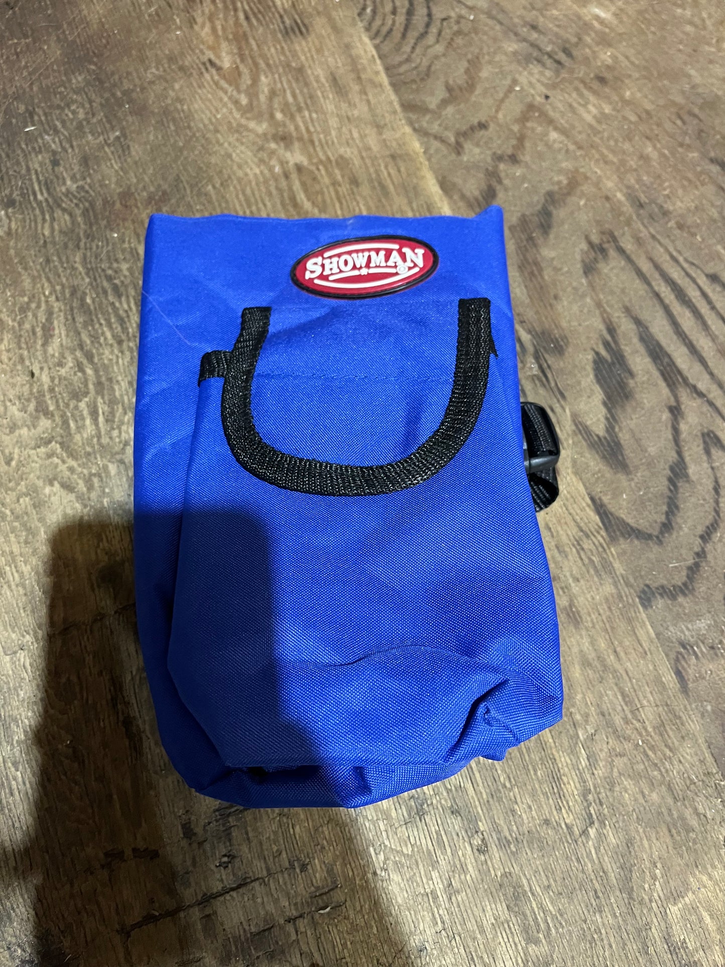 Blue bottle holder for saddle