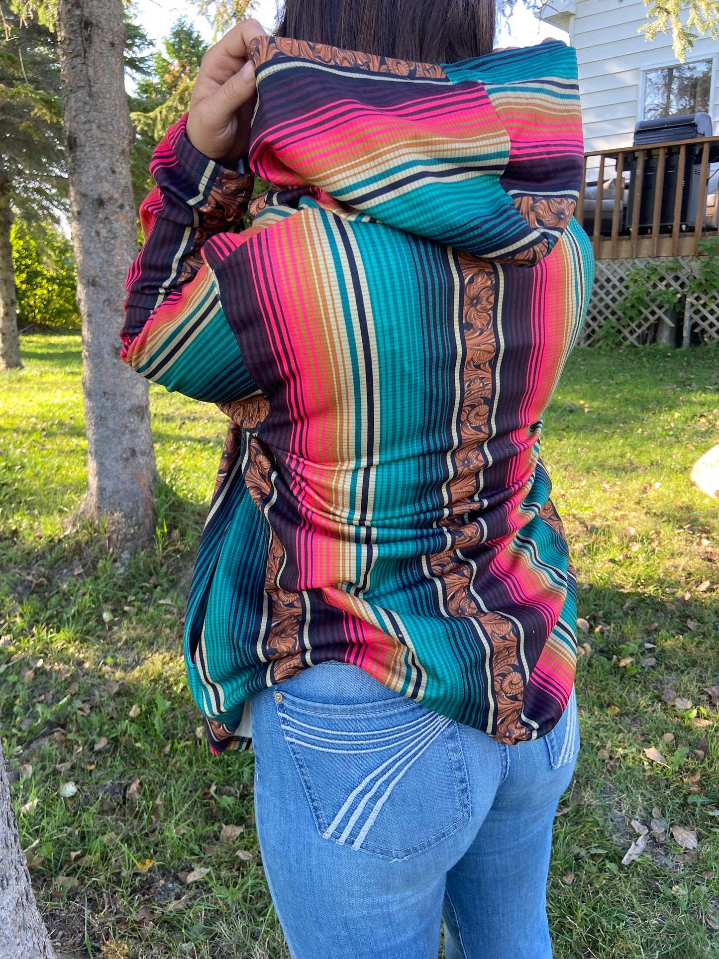 Serape with floral tooling hoody, medium. These fit roomy close out!