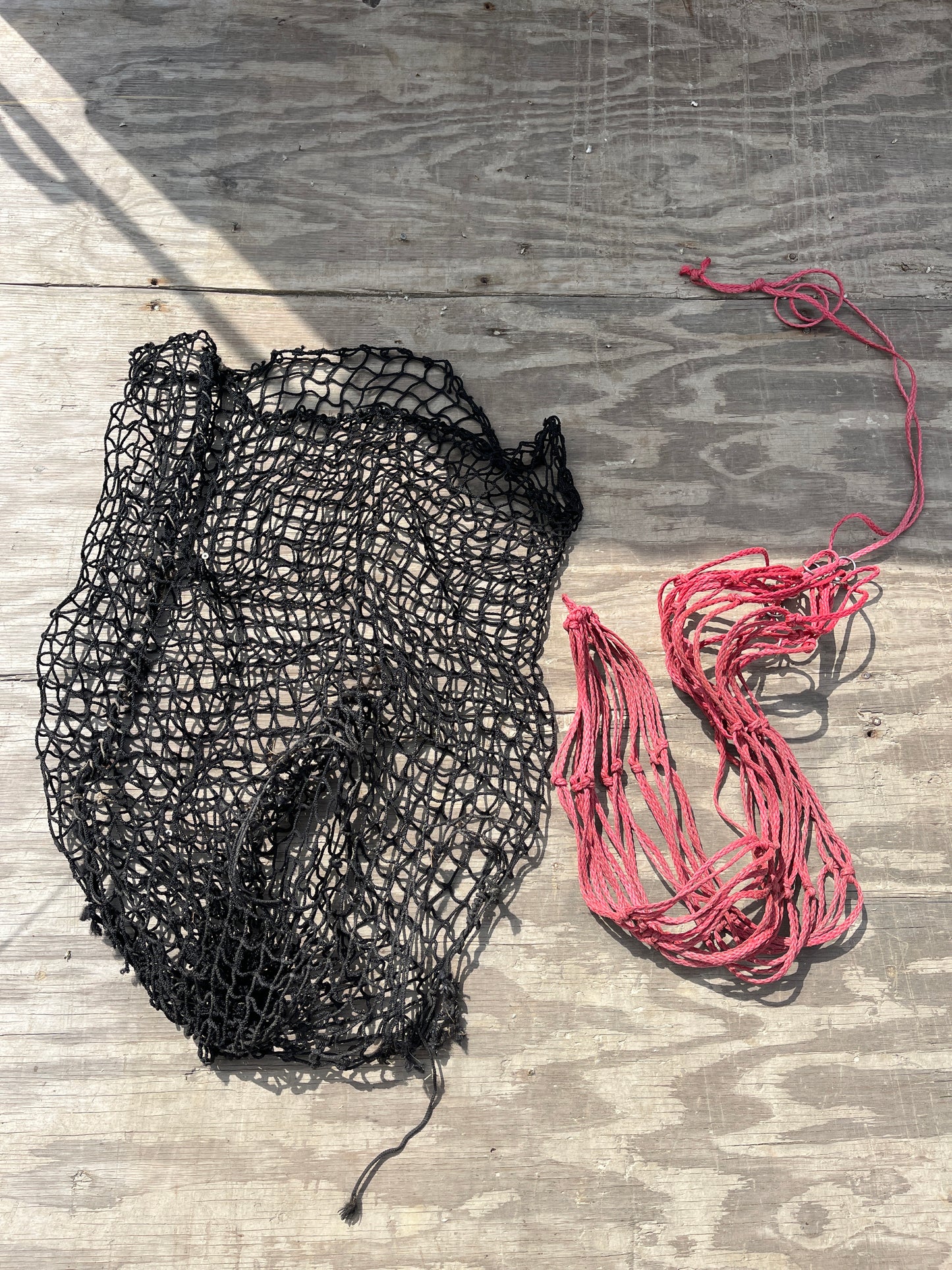 Hay nets black has 2 large holes reds great shape
