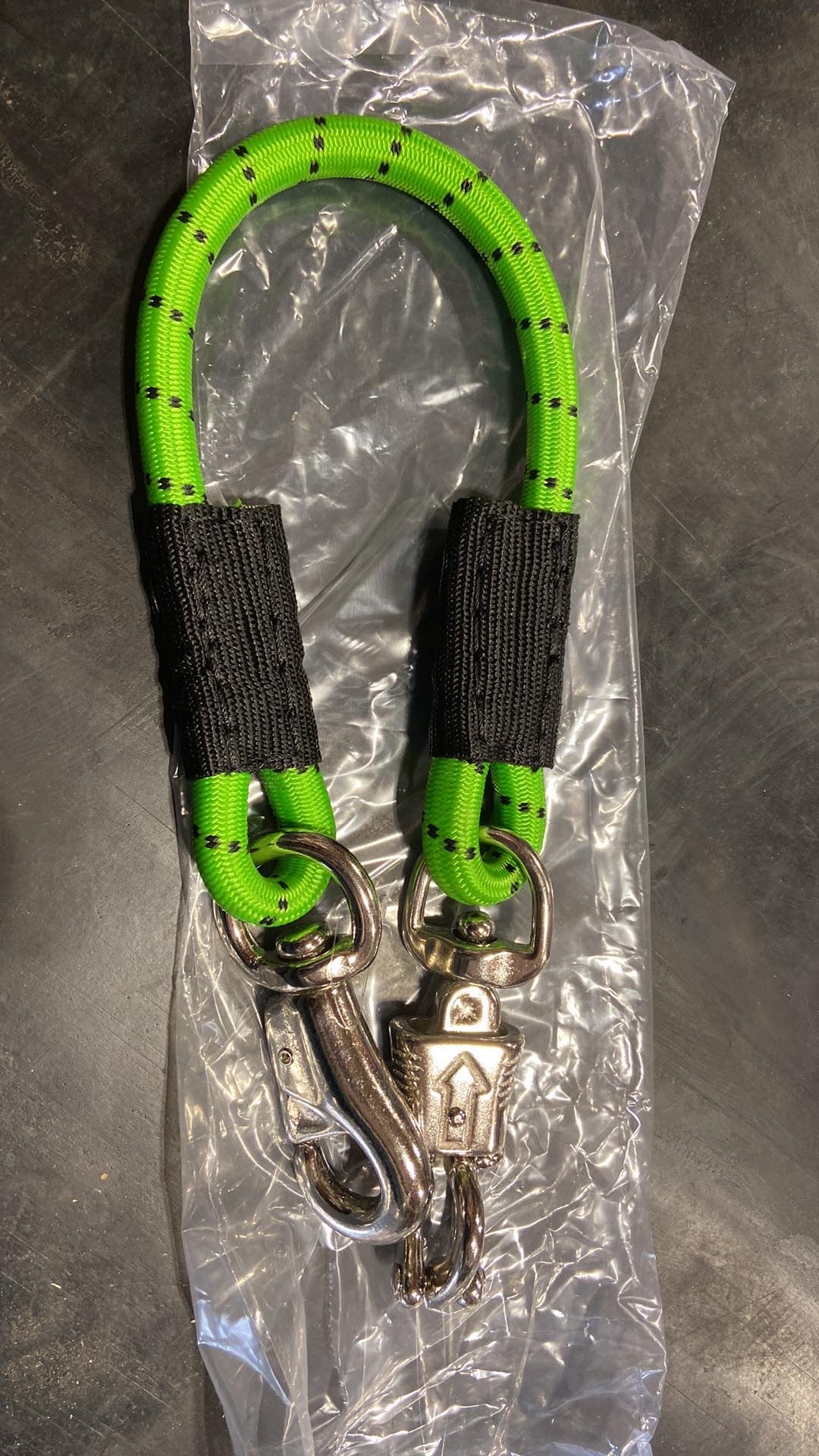 Bungee trailer ties with quick release snap