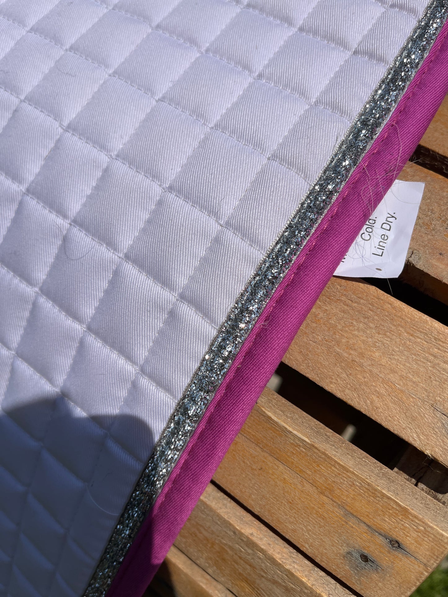 Dressage pad with fuschia trim