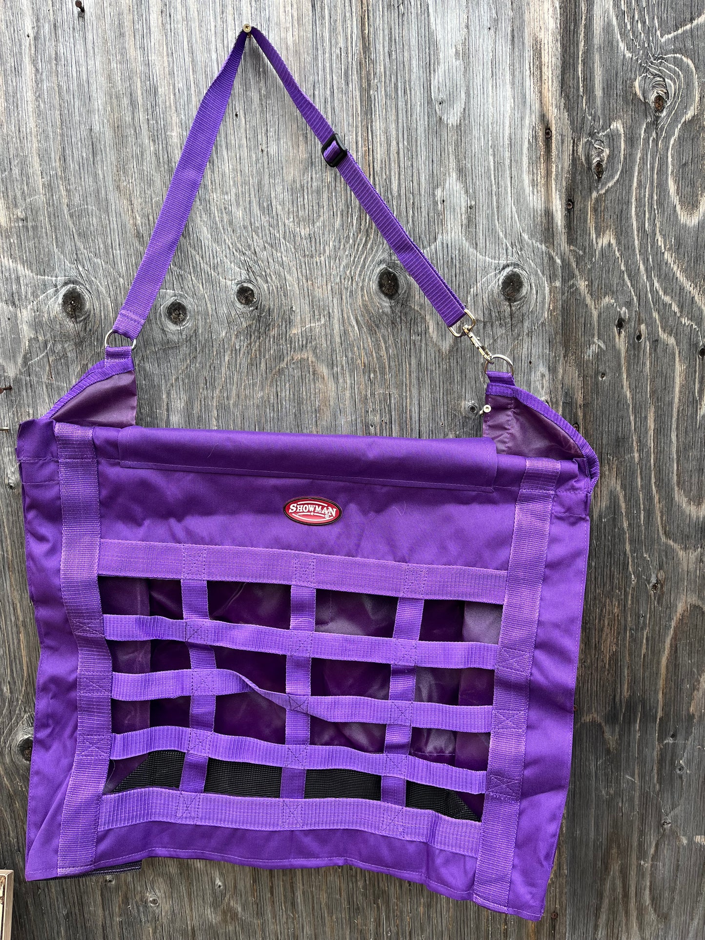 Top load purple green slow feed hay bag