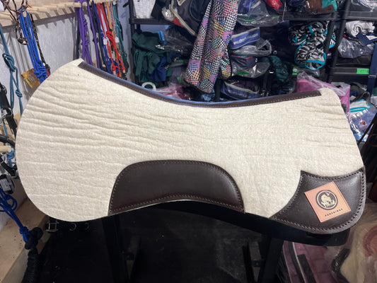 White shaped wool pad