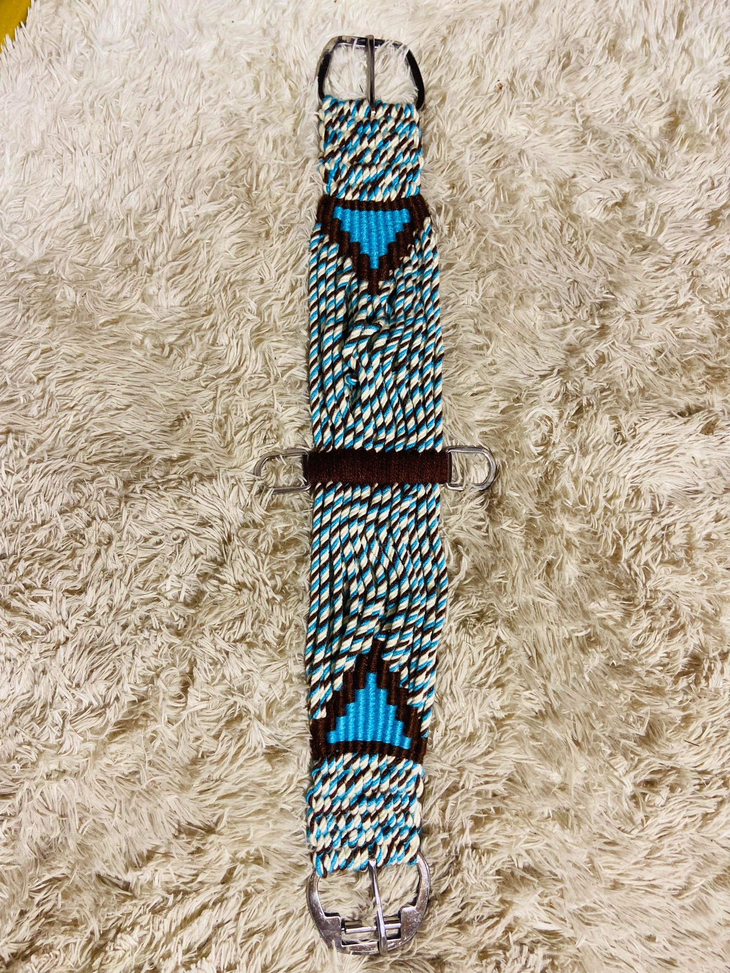 Blue and brown wool string girths