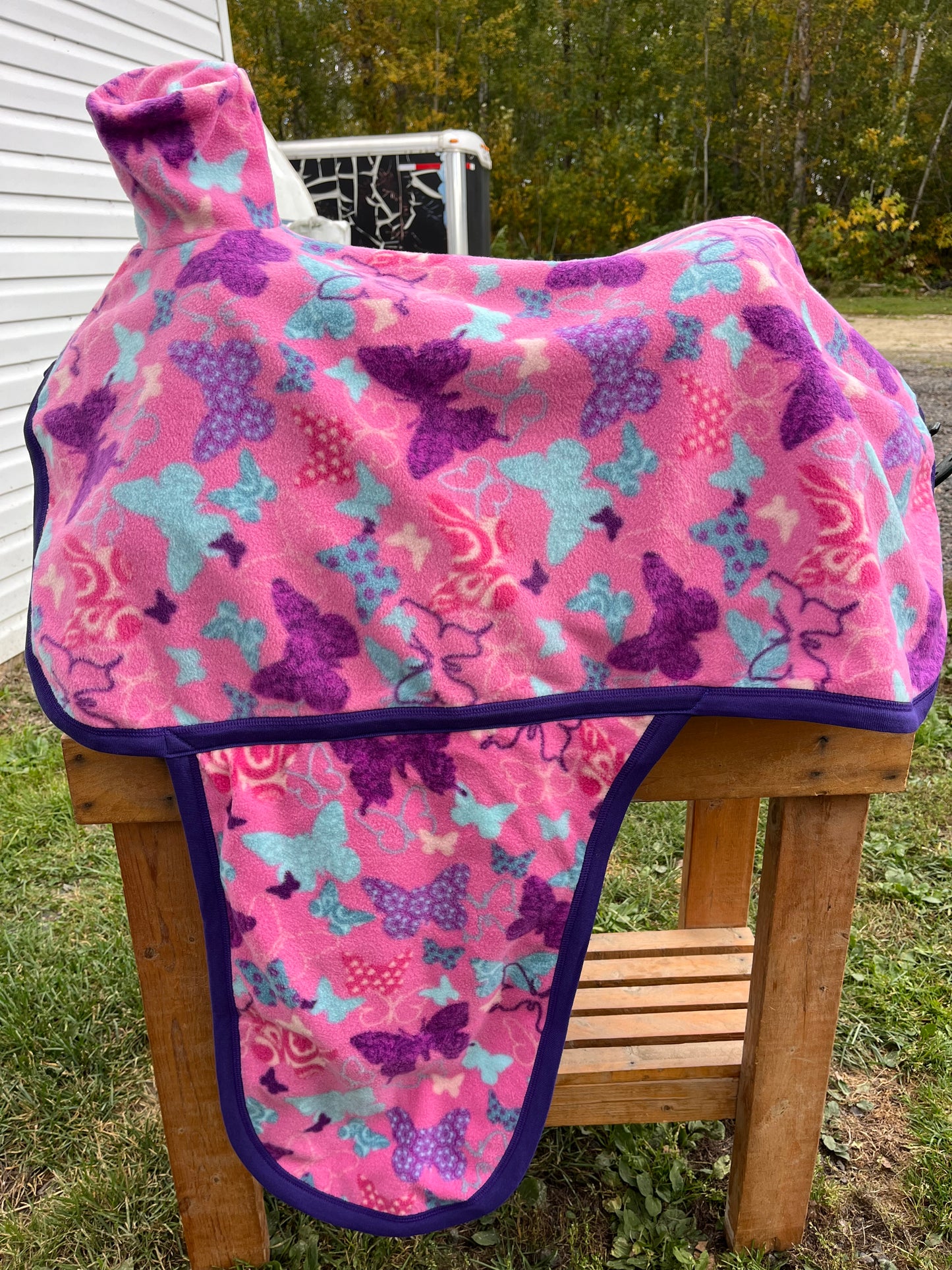 Butterfly Western fleece full coverage saddle cover with fenders, horn, & stirrup pockets