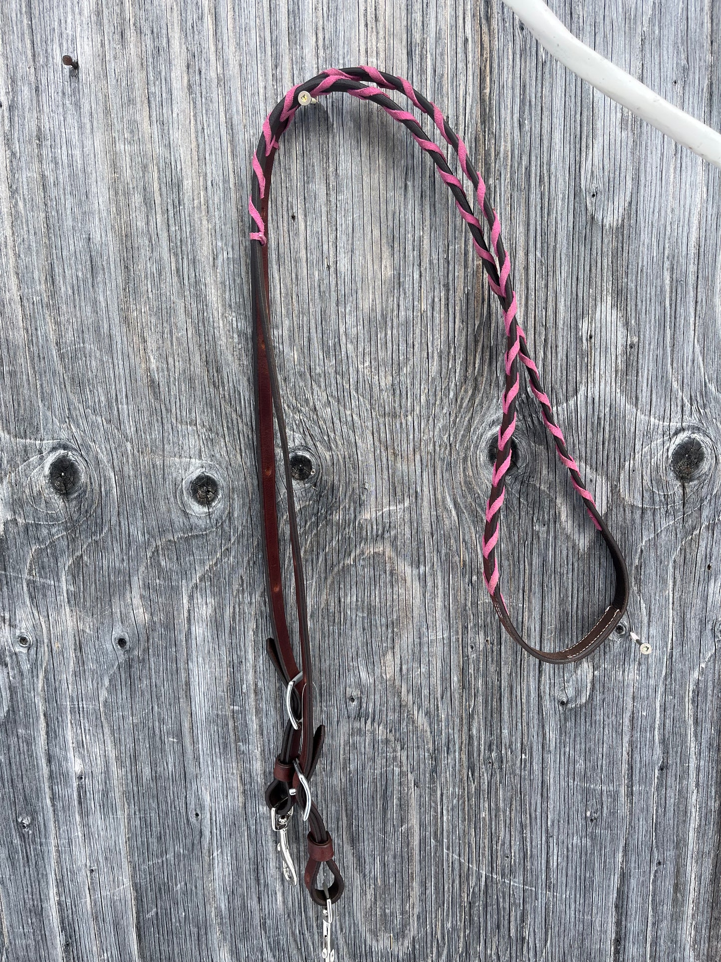 Pink laced adjustable barrel reins 7’10 at longest point with 6 holes/ side to adjust