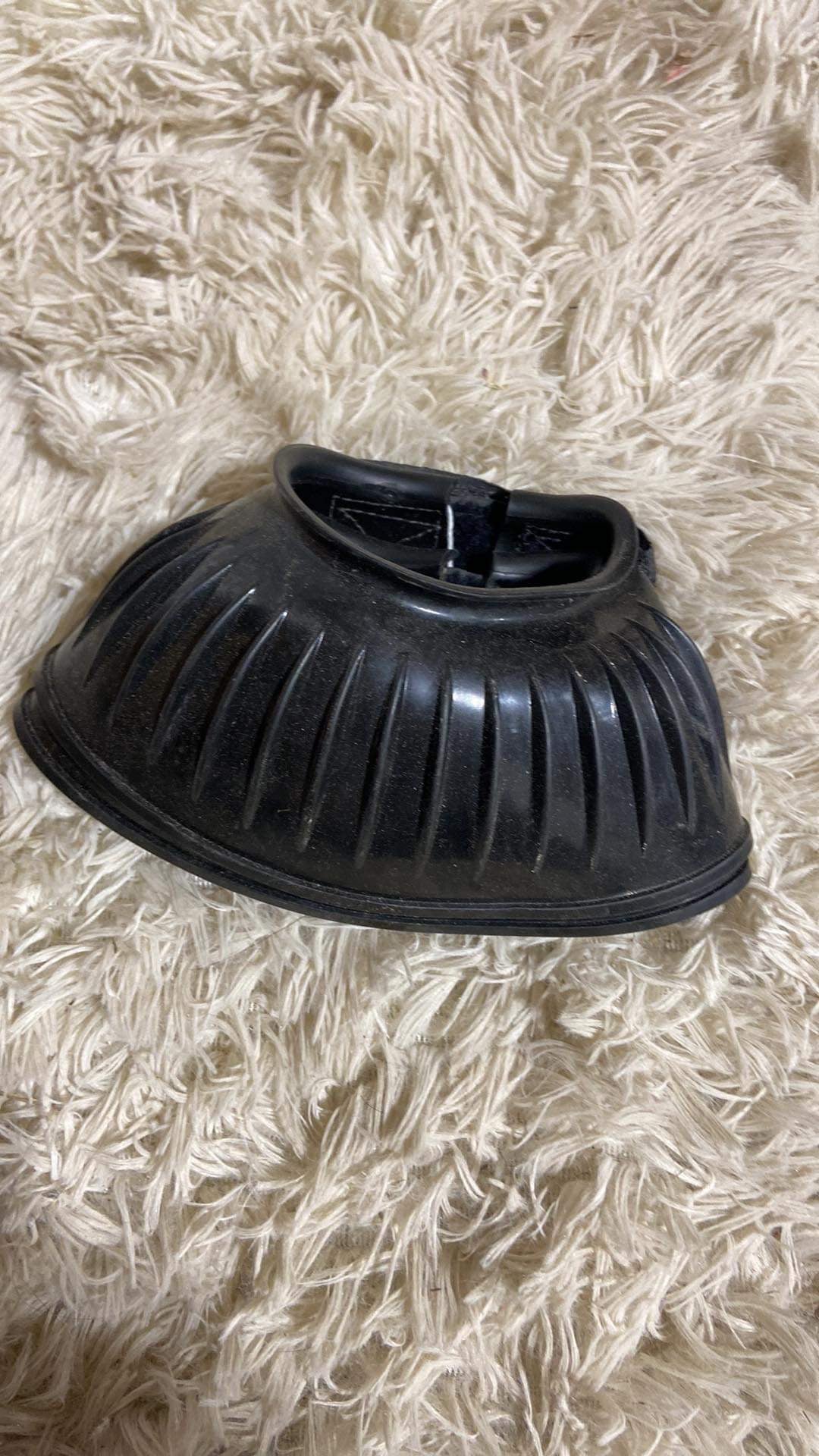 Small used rubber bell boots