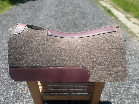 Compressed wool saddle pad
