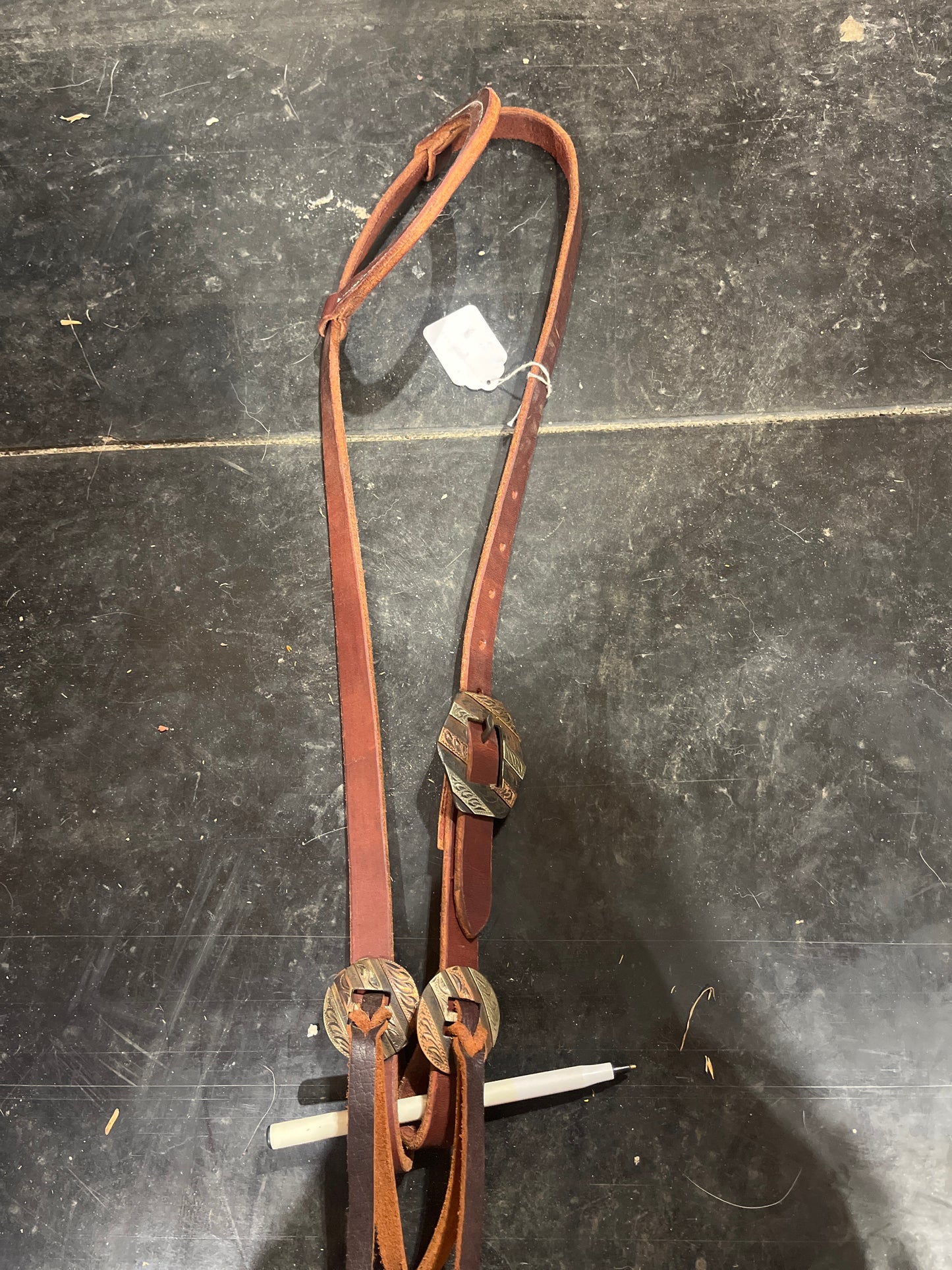 Copper oval slot concho one ear