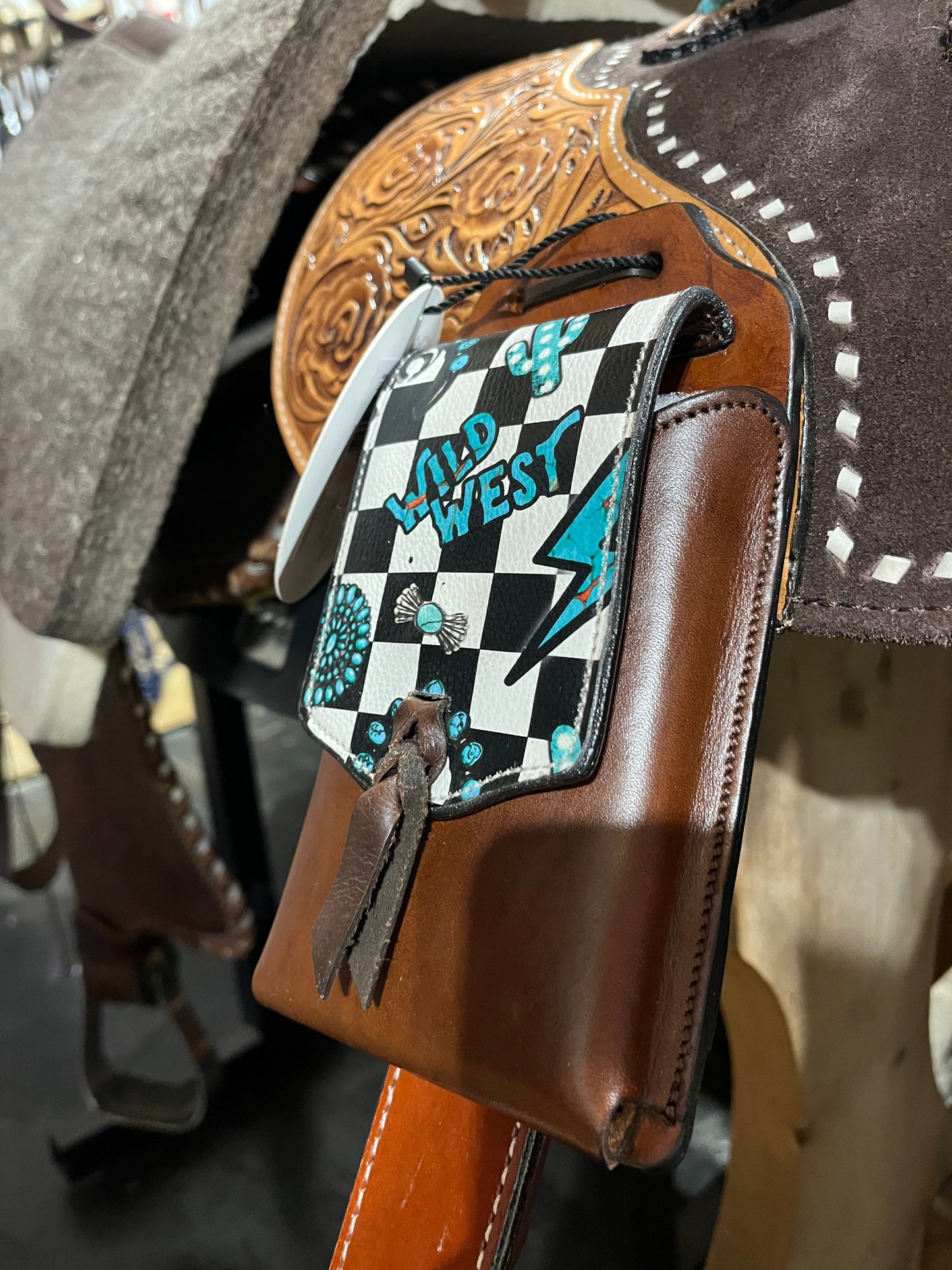 Checker print leather rear cinch saddle phone bag