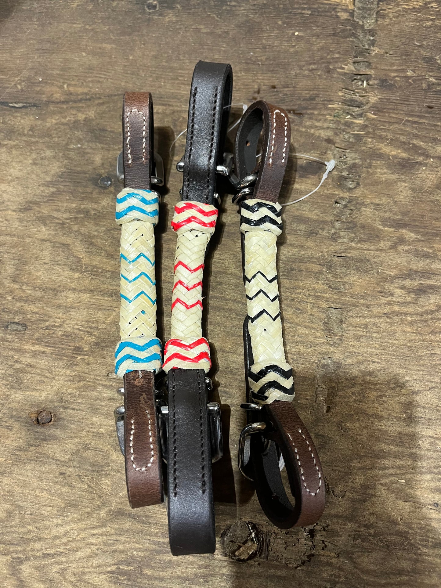 Colored rawhide curb straps