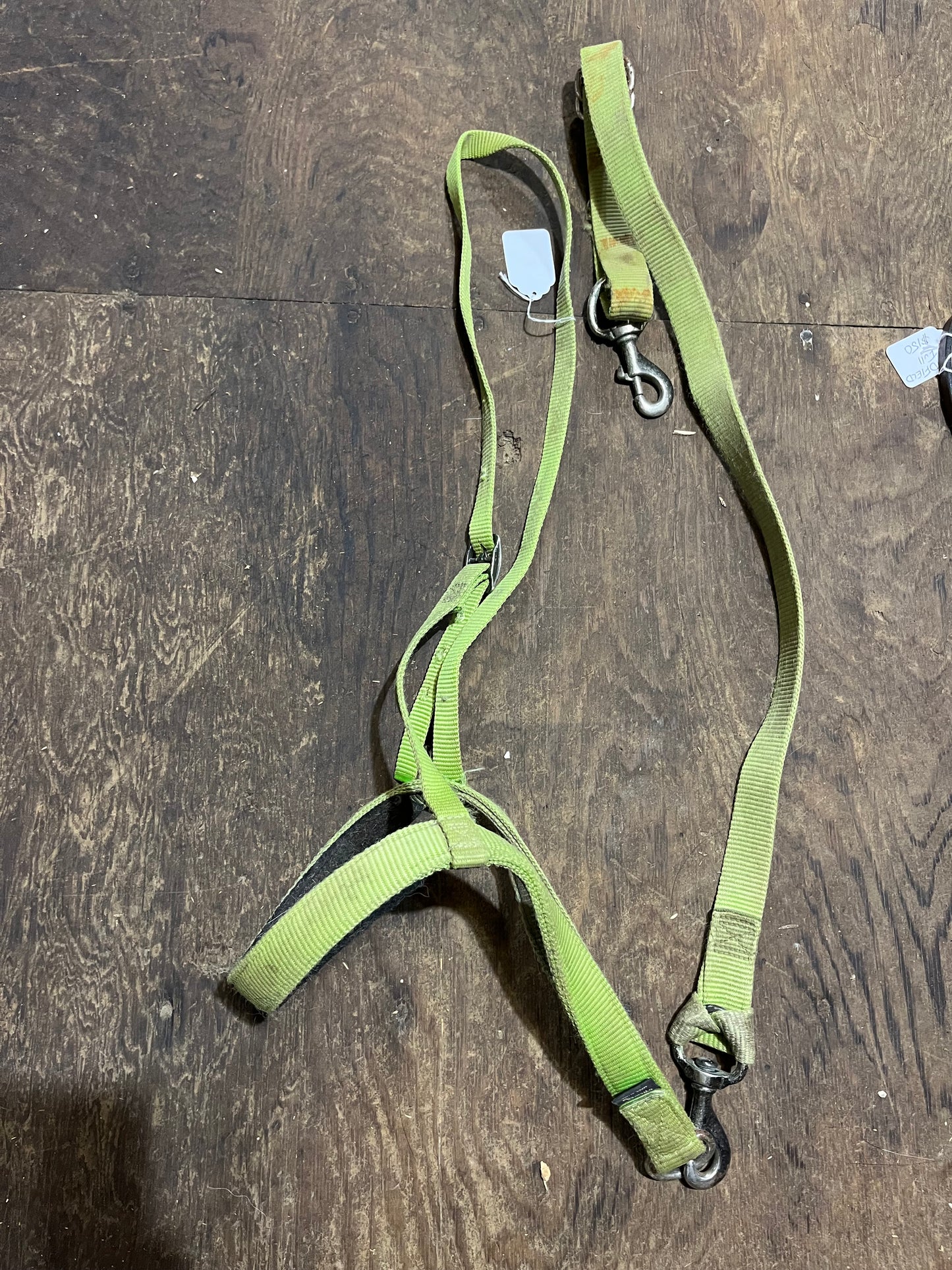 Weaver tie down with strap