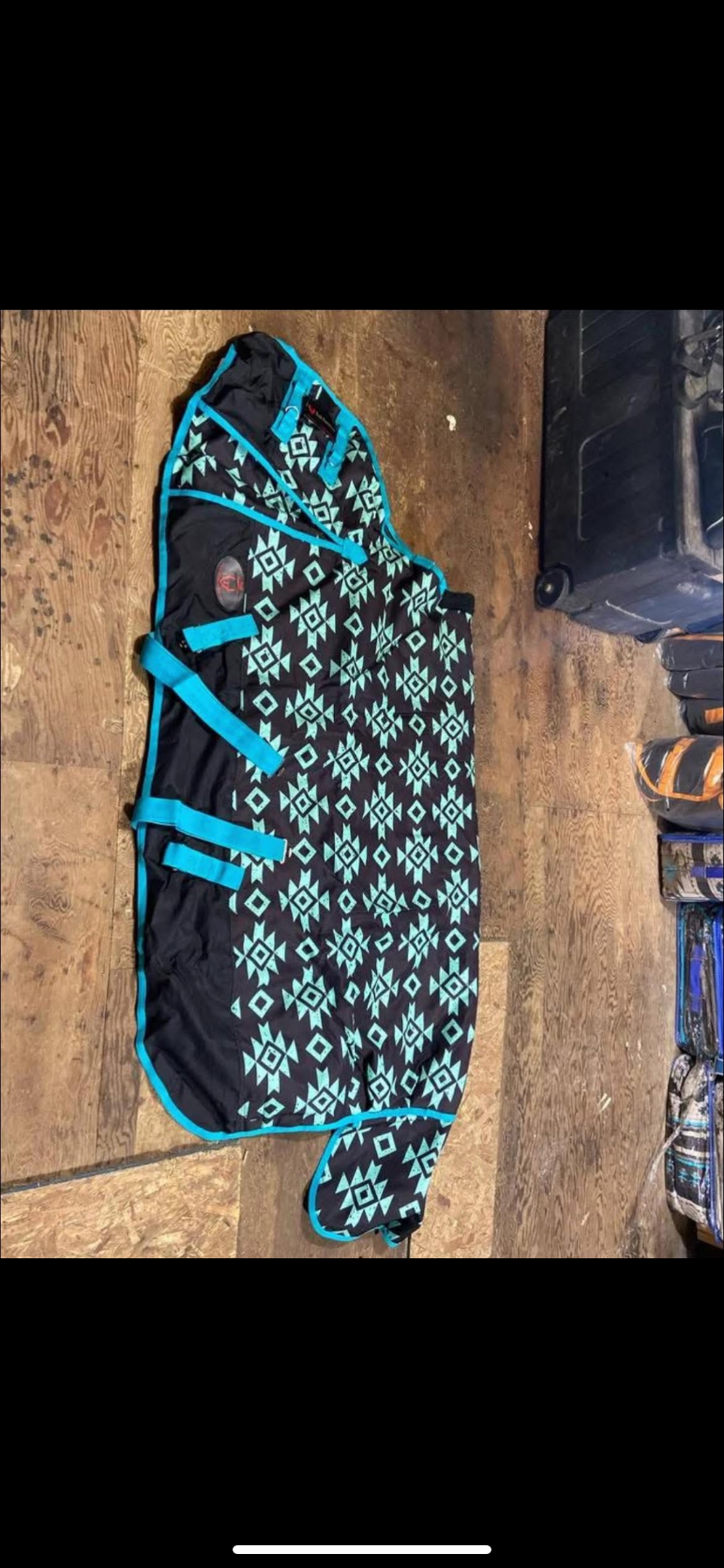 72” 300 gram teal Aztec turnout