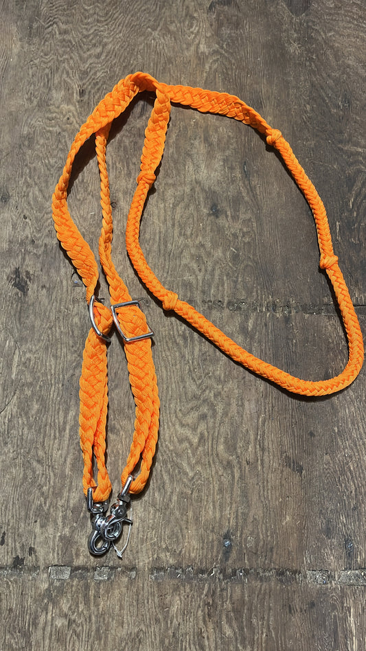 Braided adjustable orange reins with snaps