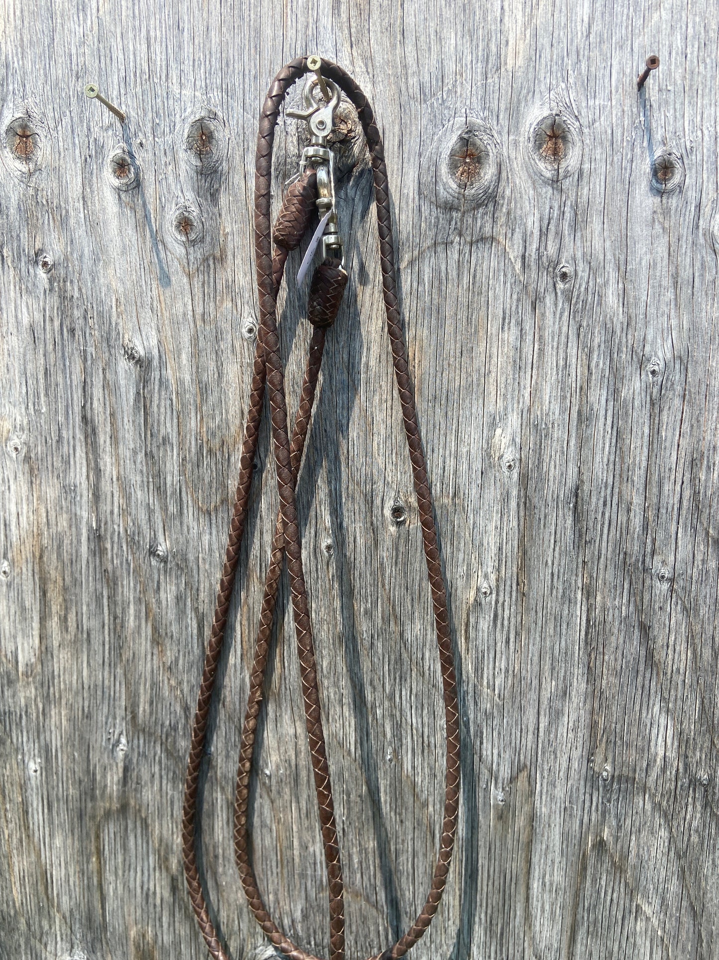 Used braided leather reins