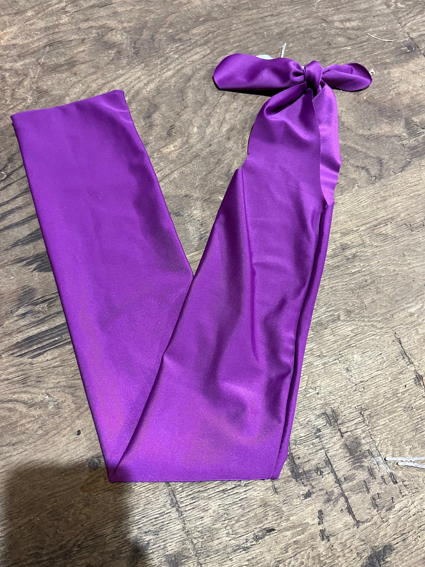 Purple slip on tail bag