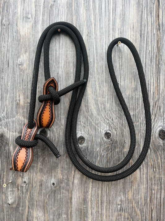 Rolled black reins with slobber straps