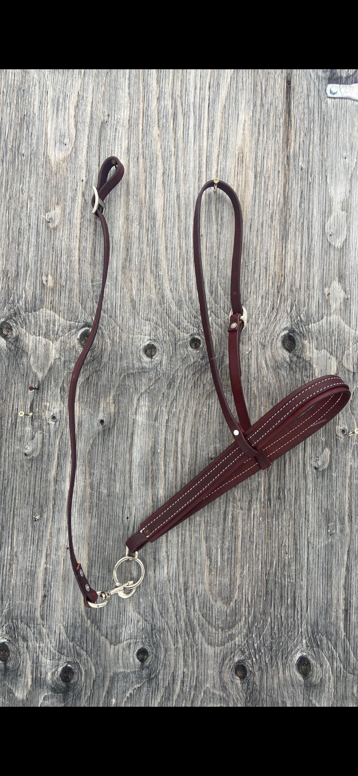 Burgundy leather tie down and strap
