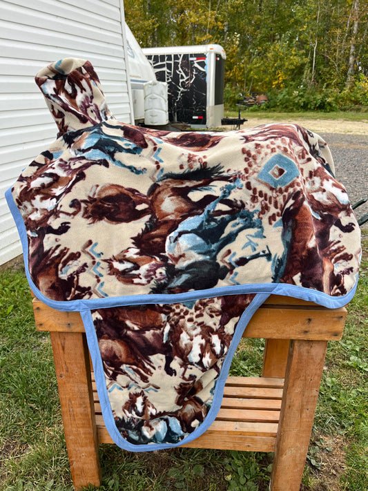Cream brown blue horse print western fleece full coverage saddle cover with fenders, horn, & stirrup pockets
