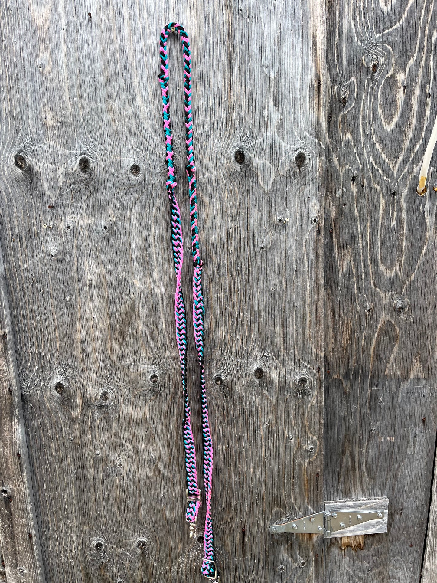 Pink teal black barrel reins