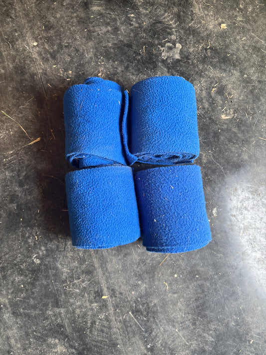 Four blue polos