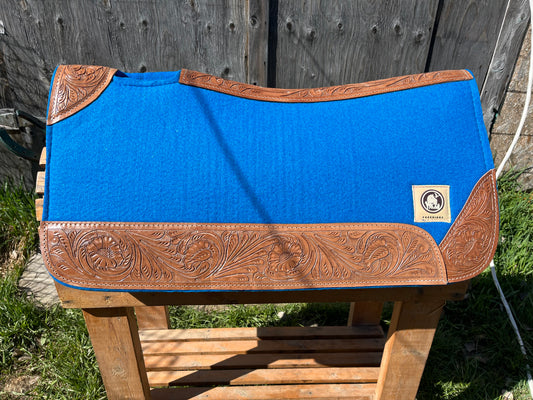 Blue wool pad with tooled leather