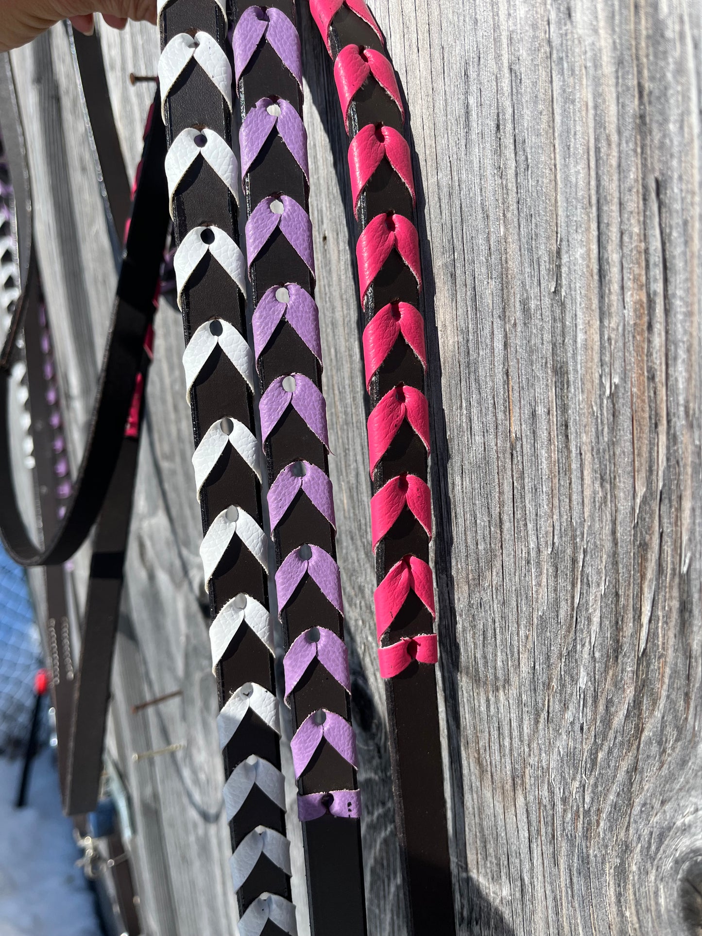 Colorful laced adjustable leather reins, 9ft6 at longest hole with 8 holes per side to adjust