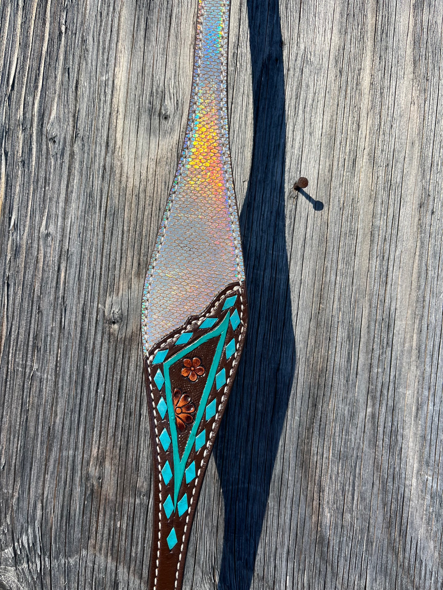 Silver and teal wither strap