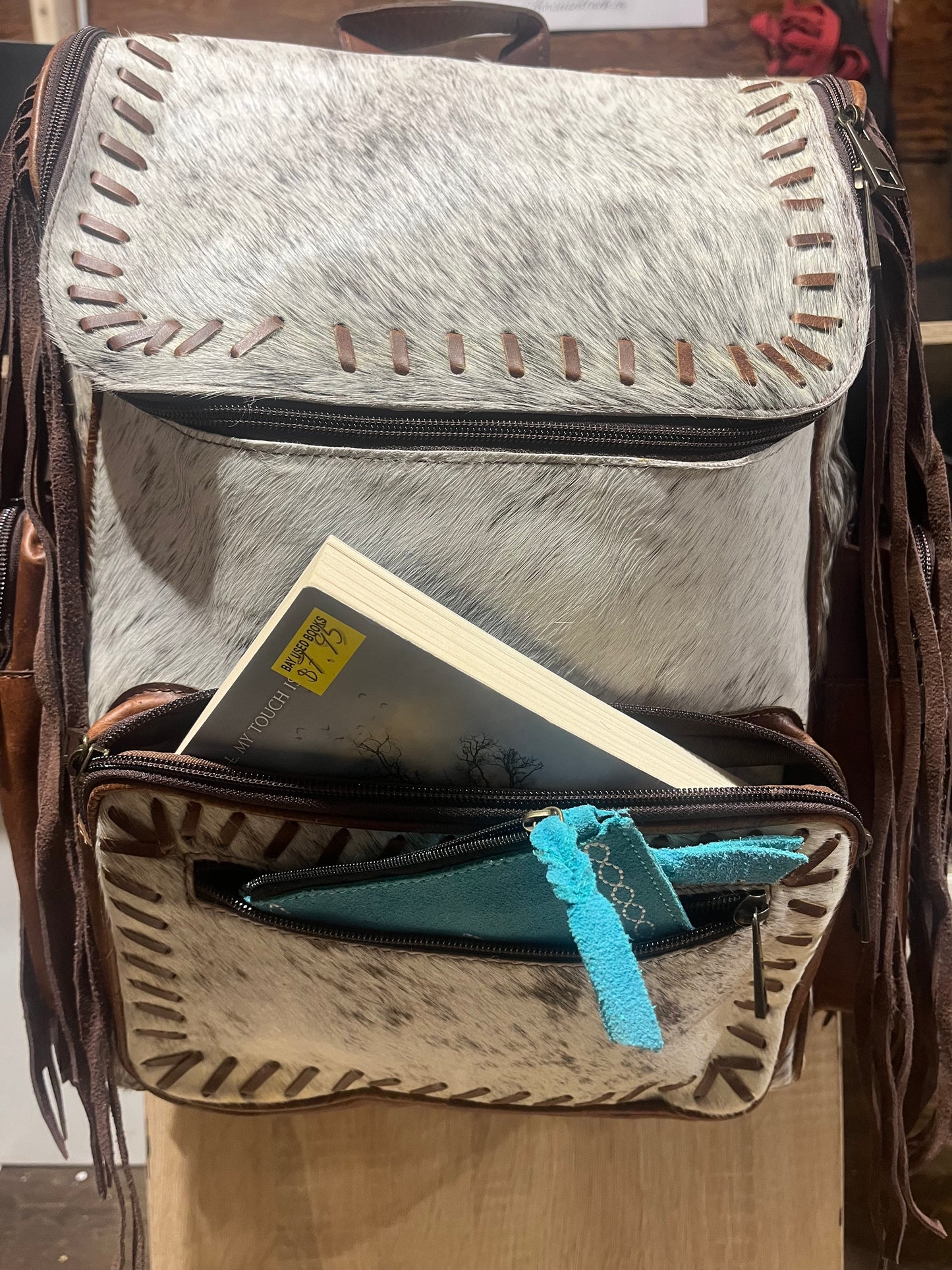 Hair on cowhide backpack