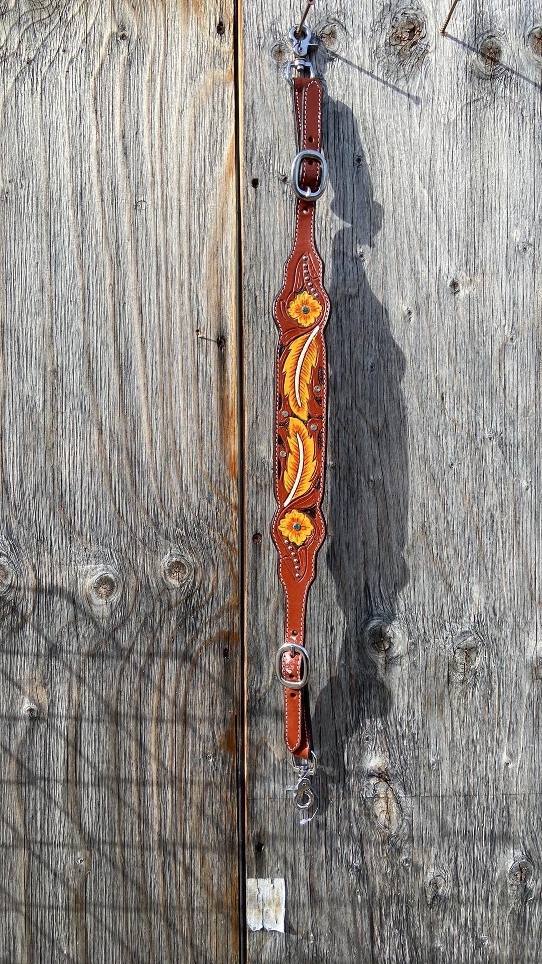 Orange feather wither strap