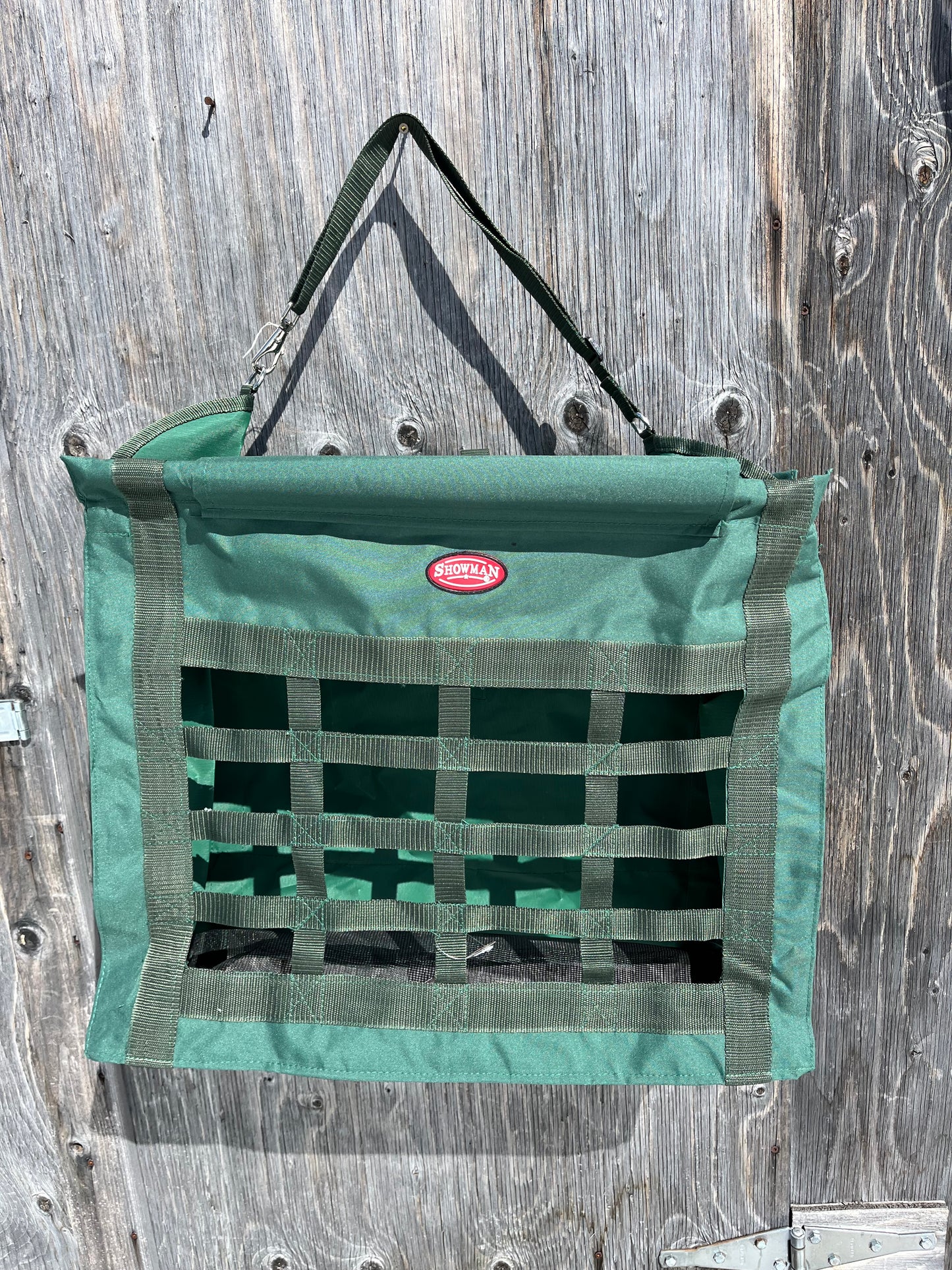 Top load hunter green slow feed hay bag