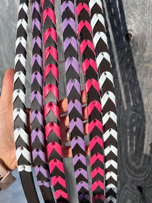 Colorful laced adjustable leather reins, 9ft6 at longest hole with 8 holes per side to adjust
