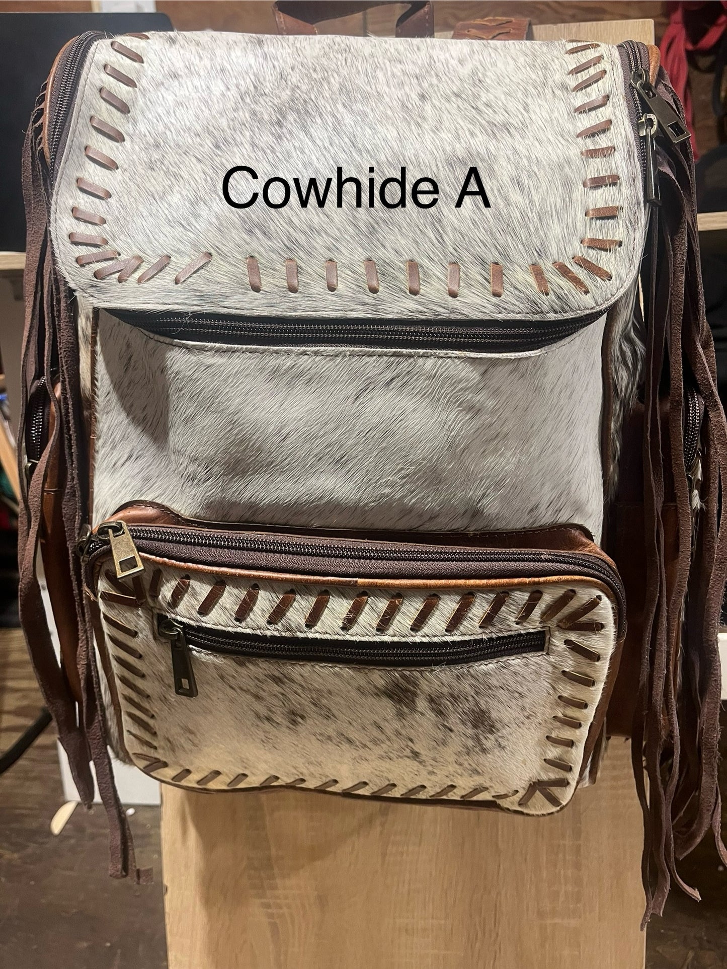 Hair on cowhide backpack