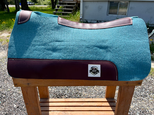 Dusty blue wool pad with wither relief and leg cut out