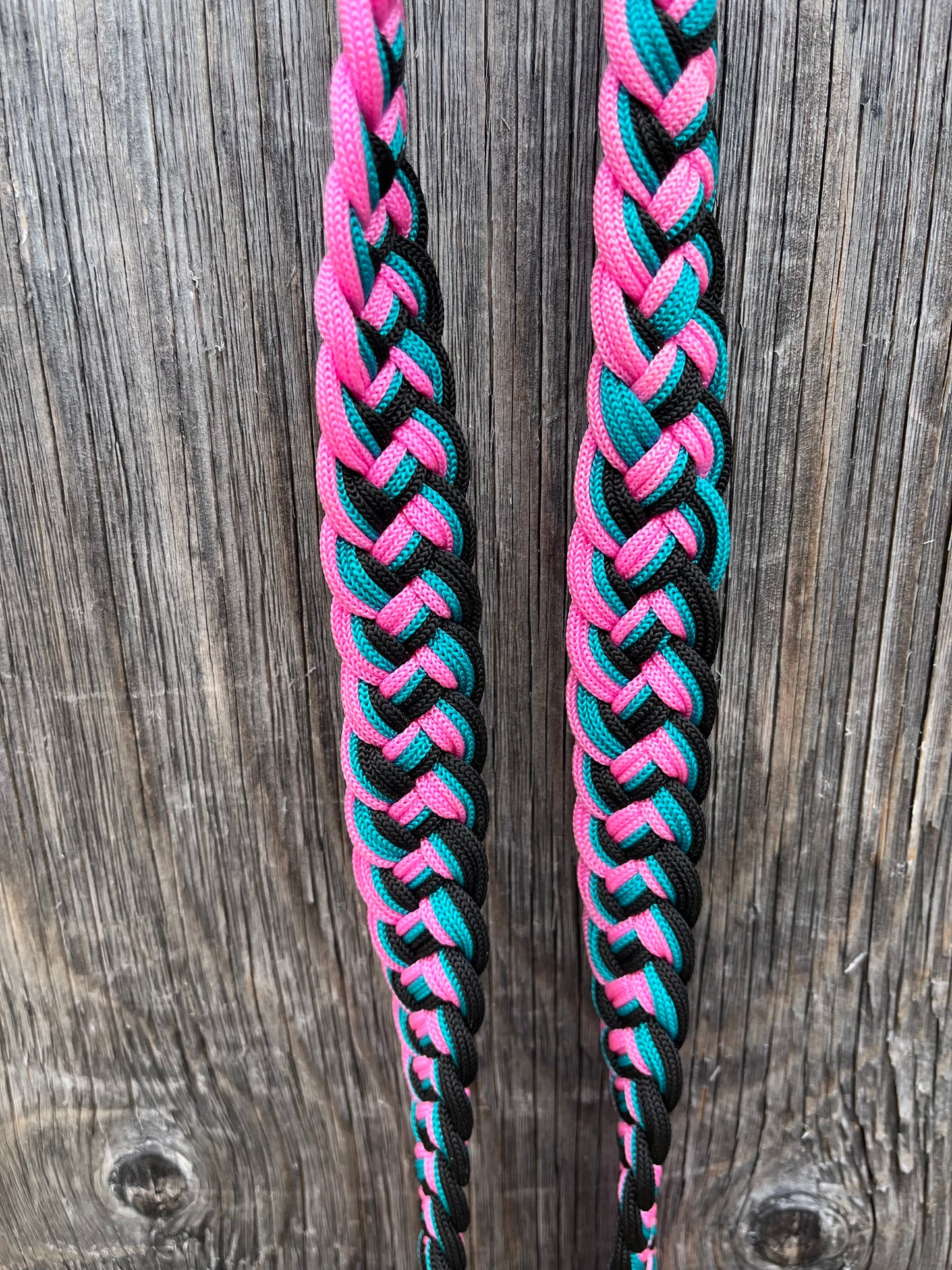 Pink teal black barrel reins