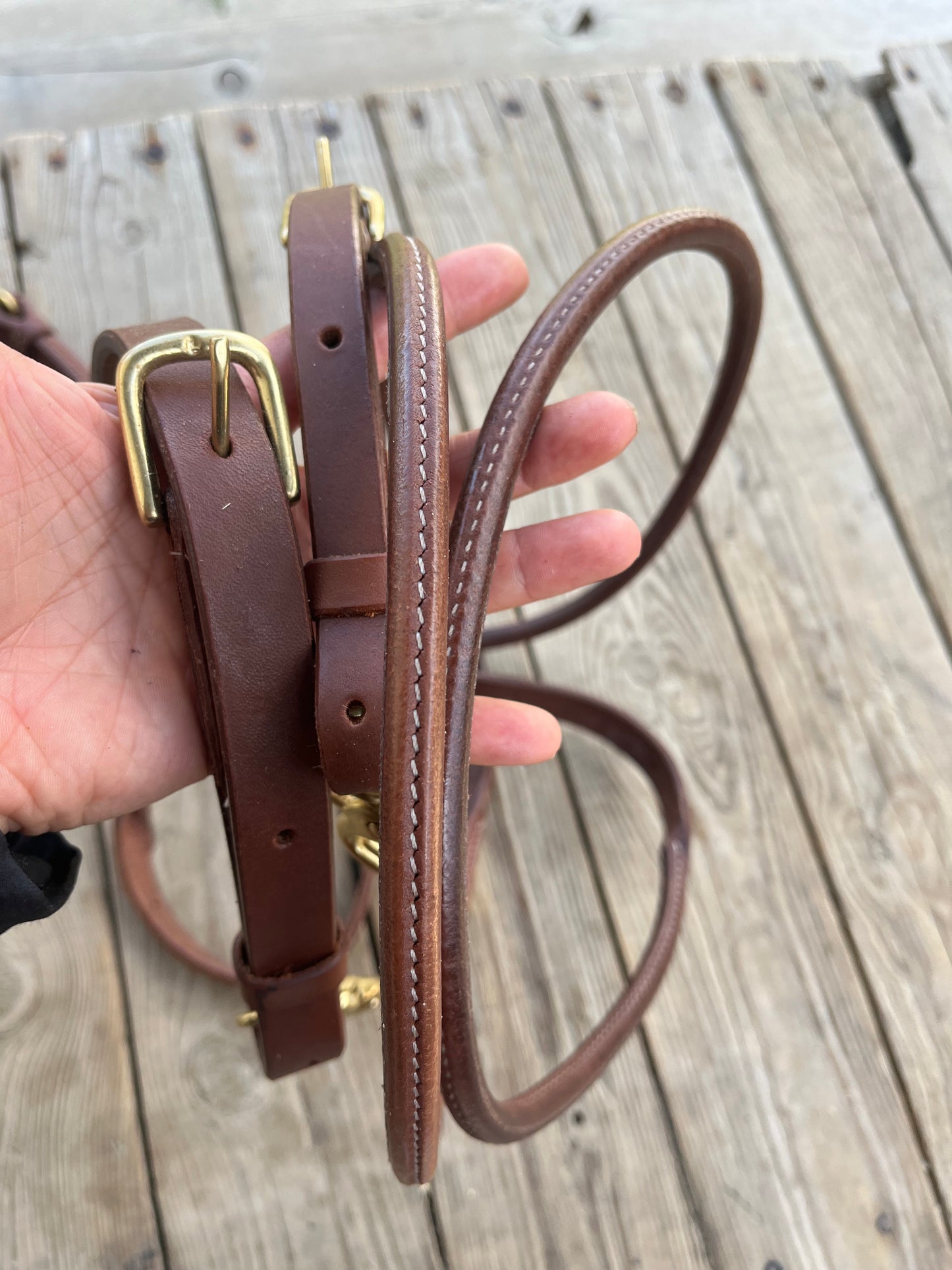 Rolled fully adjustable length supple leather barrel/ roping reins with snaps