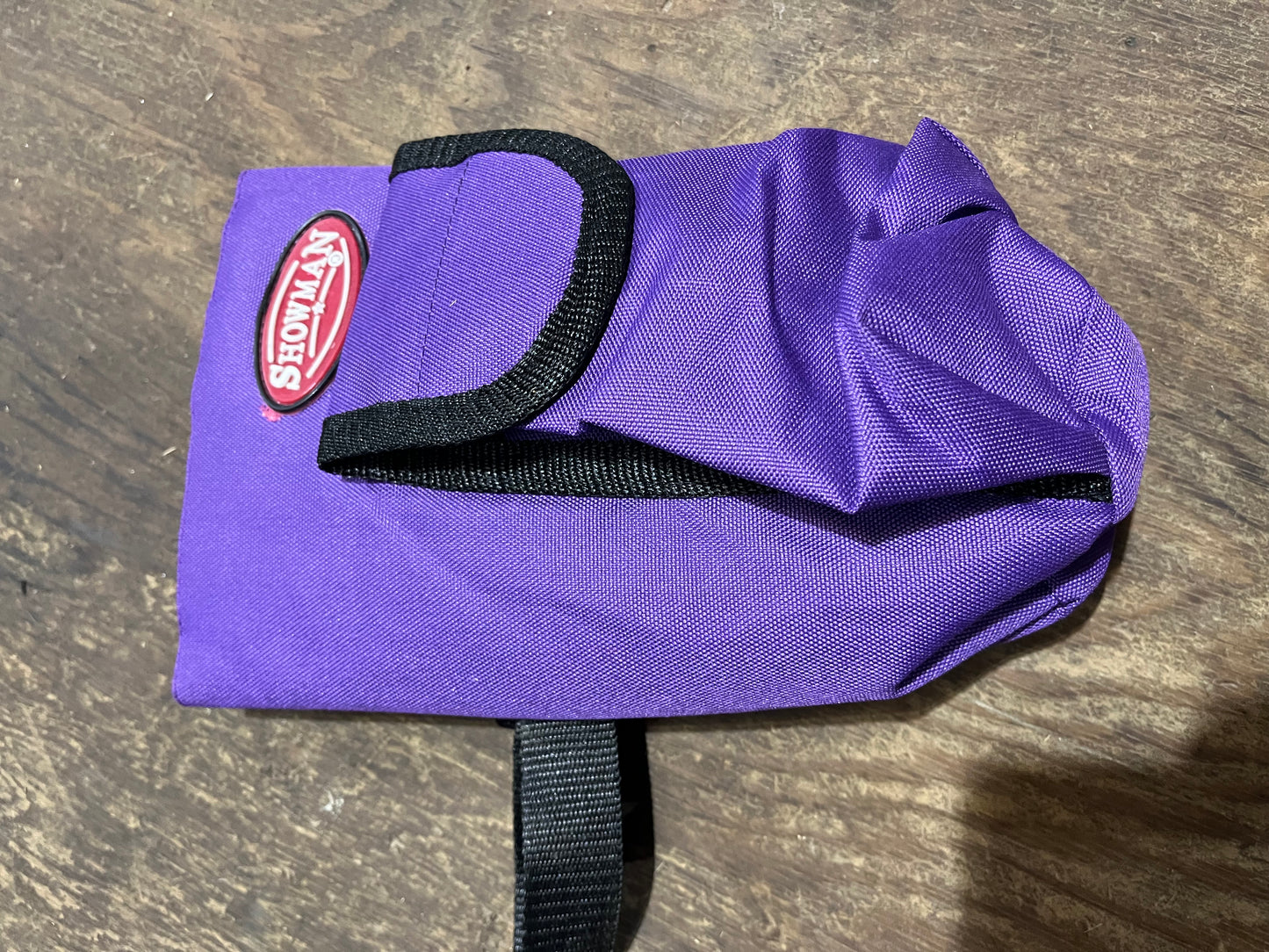 Purple saddle bottle holder