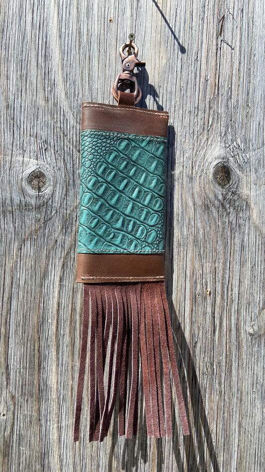 Turquoise gator clip on phone case with fringe