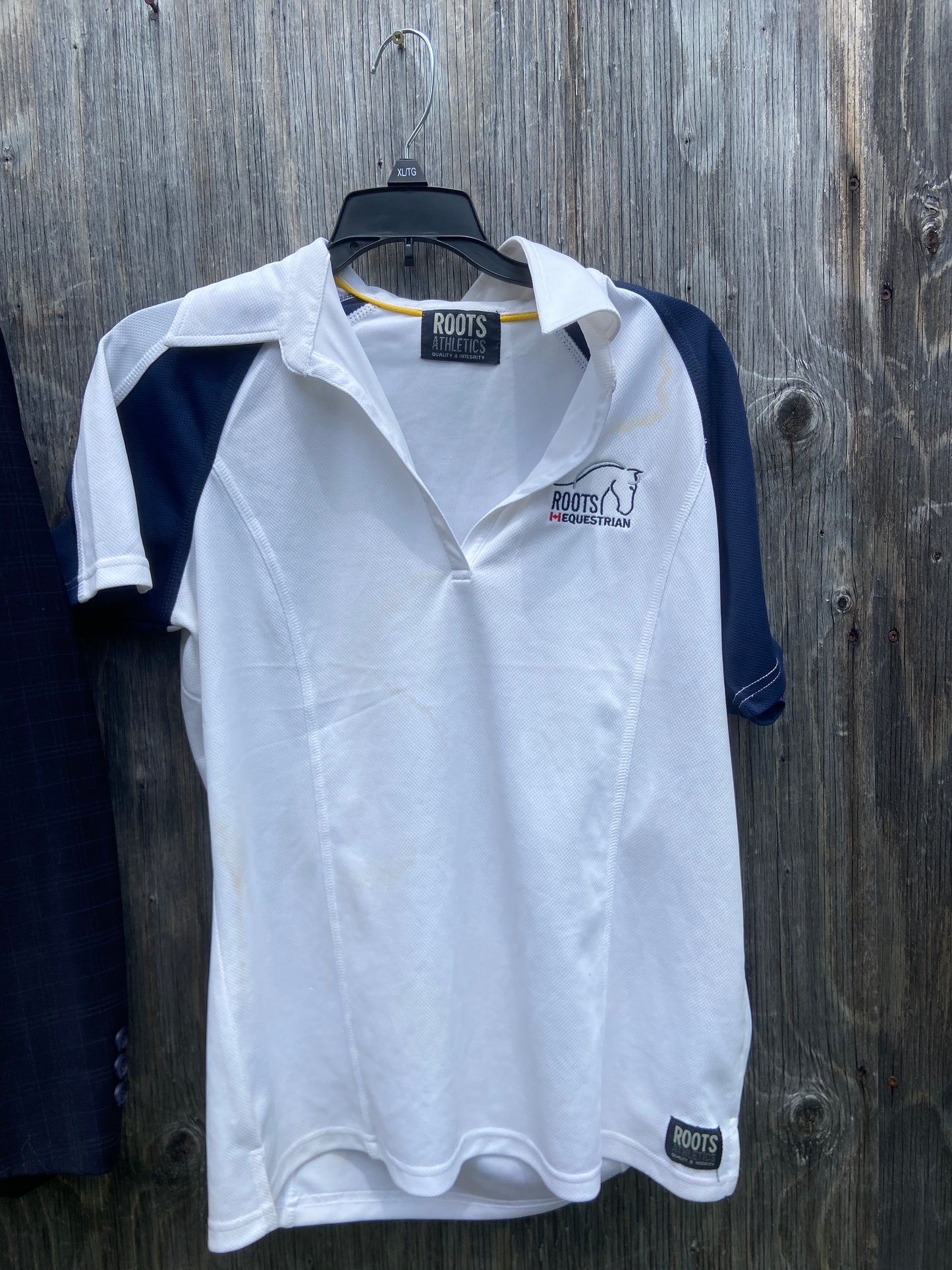 Roots equestrian large has stain