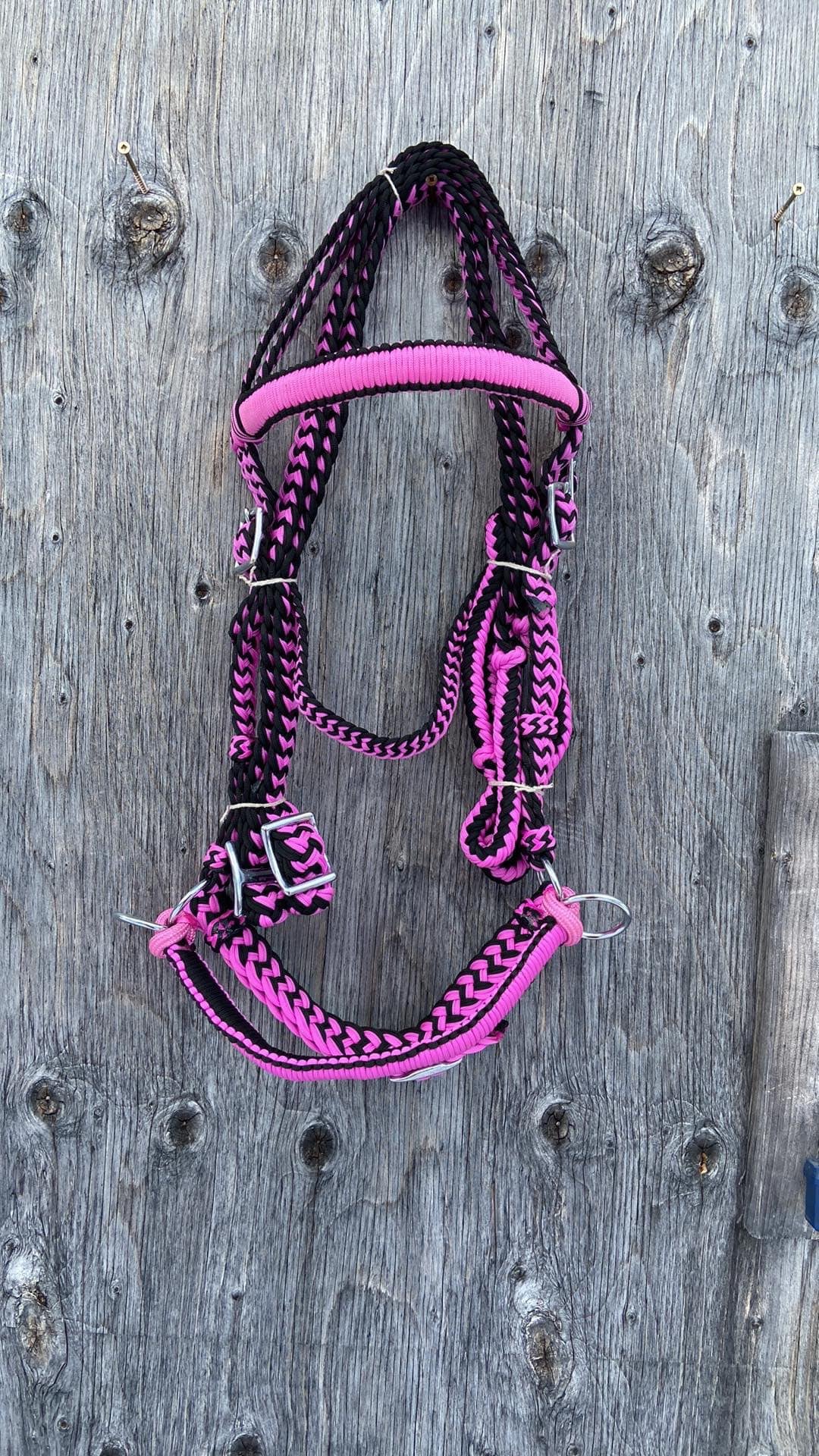 Pink bitless bridle with reins