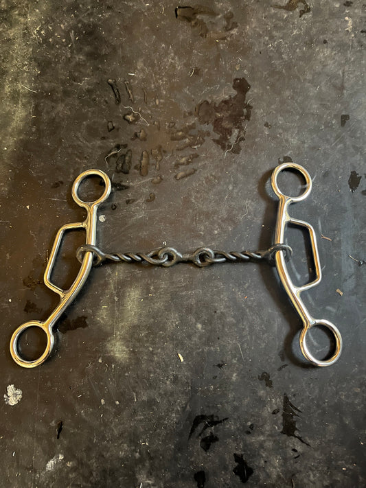 Twisted dogbone sliding gag