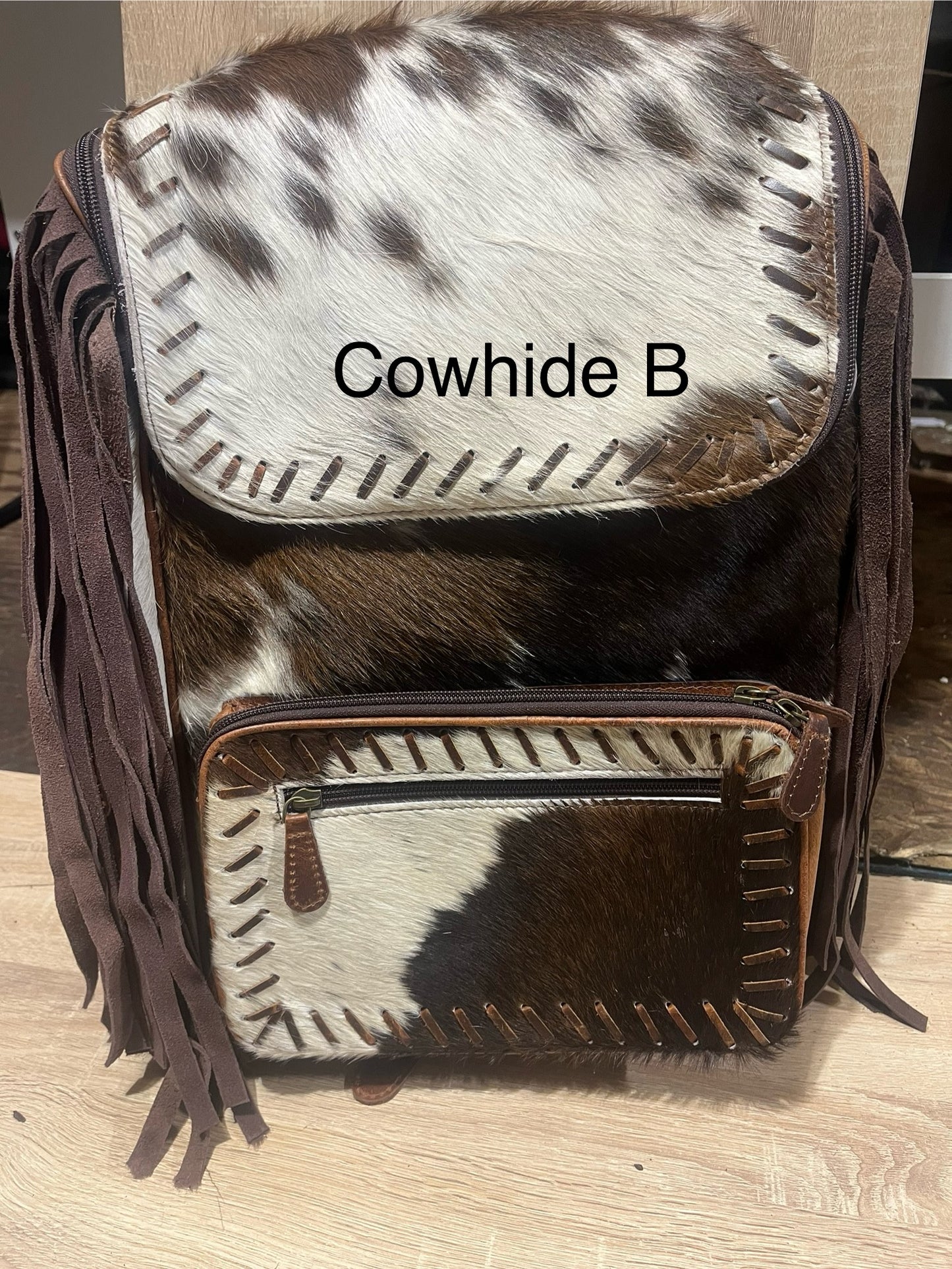 Hair on cowhide backpack