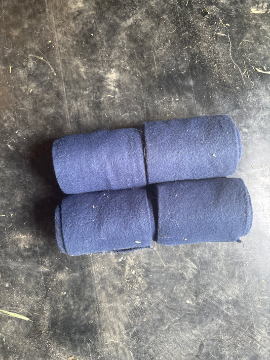 Set of four navy blue polos