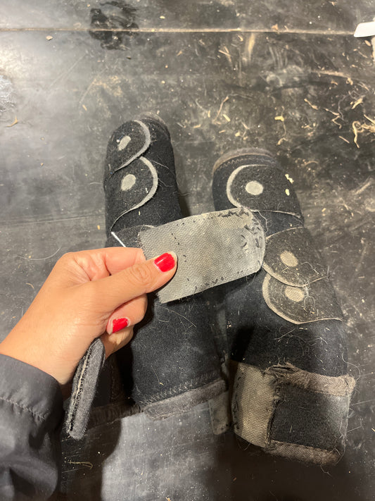 Black smb boots need a strap sewn back on