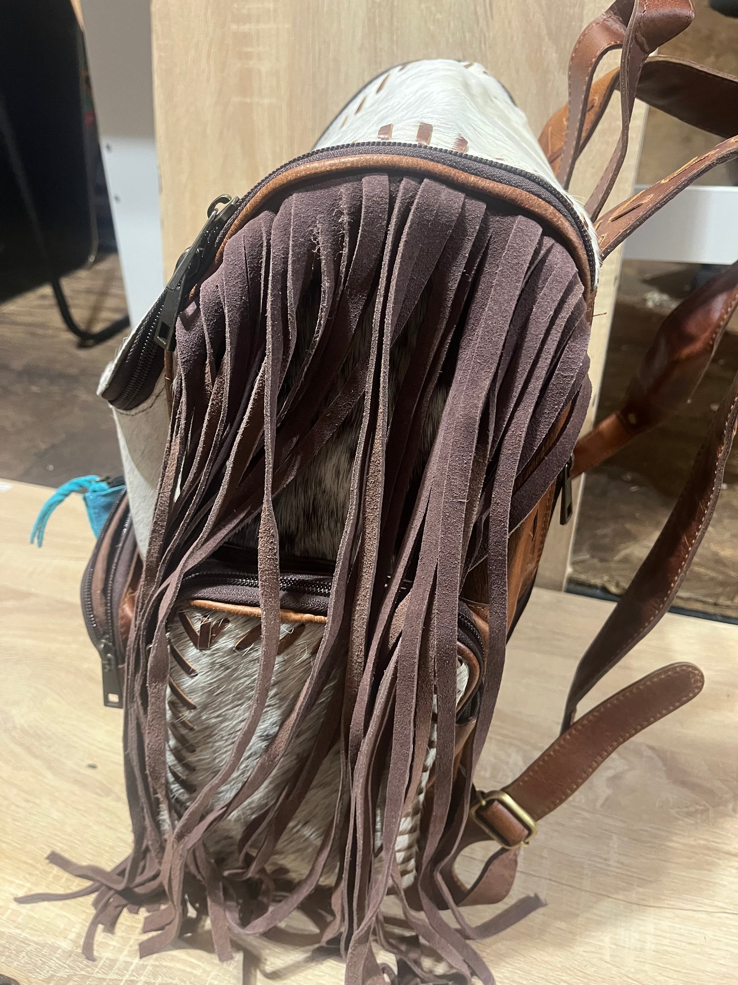 Hair on cowhide backpack