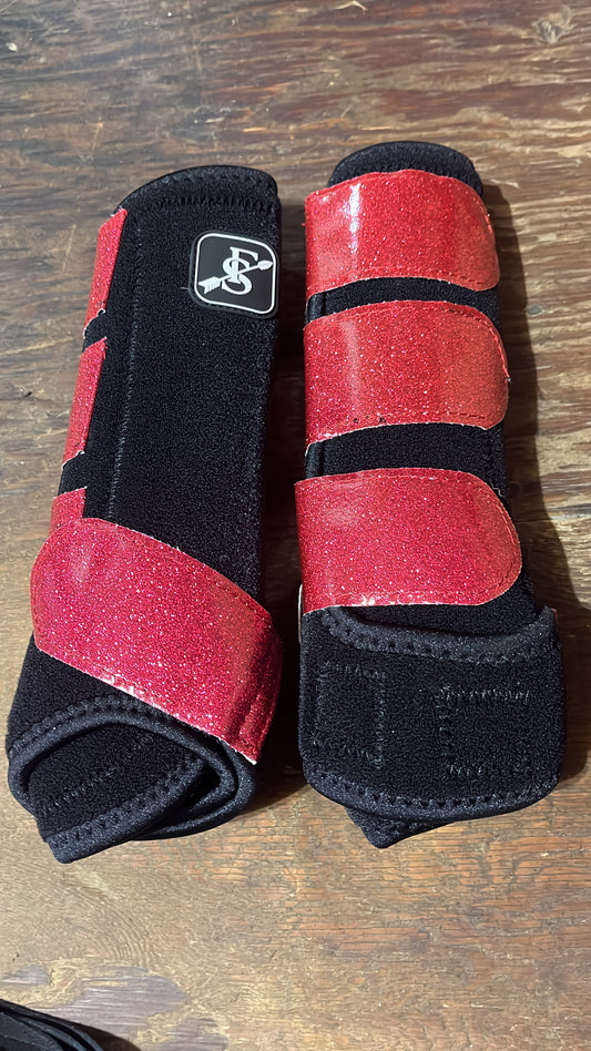 Black medium sport boots with pink straps