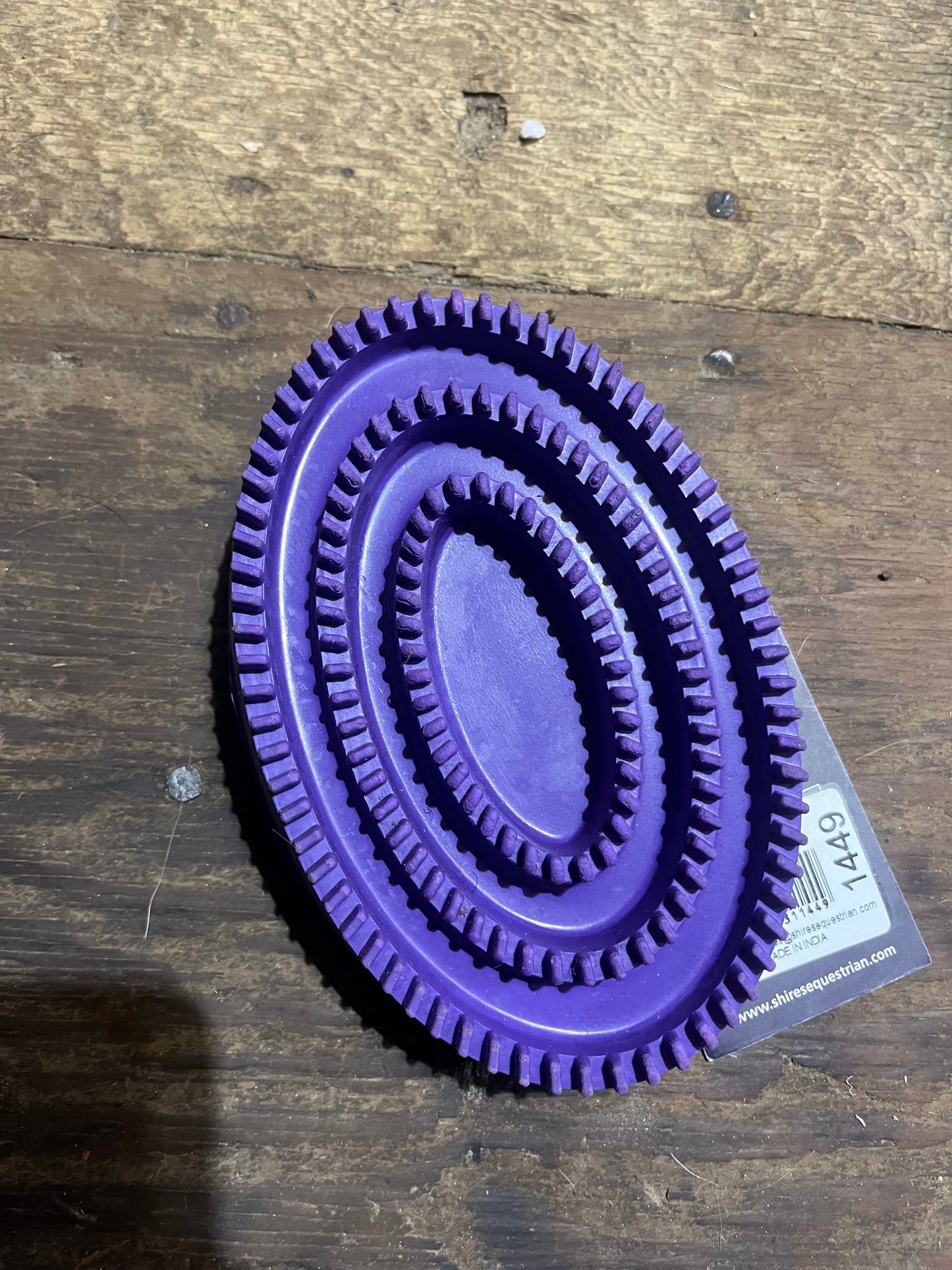Purple curry comb