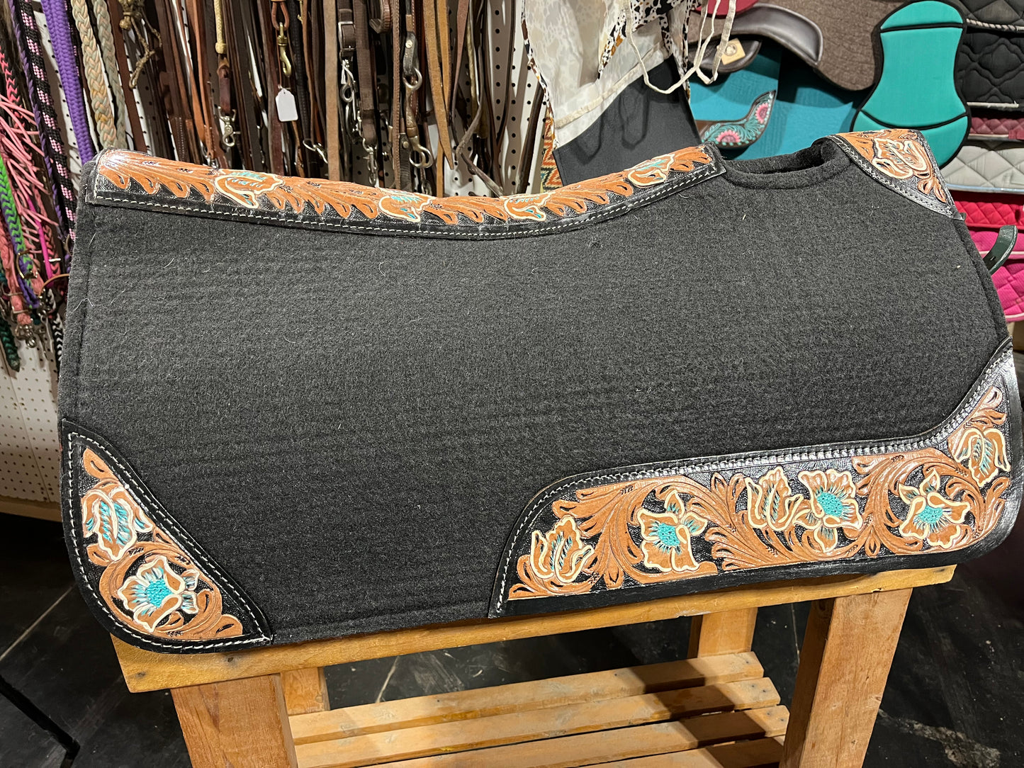 Black western pad with tooled leather